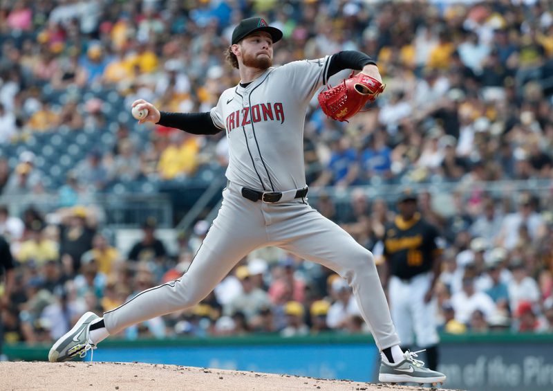 Aug 4, 2024; Pittsburgh, Pennsylvania, USA;  Arizona Diamondbacks starting pitcher Ryne Nelson (19) delivers a pitch against the Pittsburgh Pirates/ during the first inning at PNC Park. Mandatory Credit: Charles LeClaire-USA TODAY Sports
