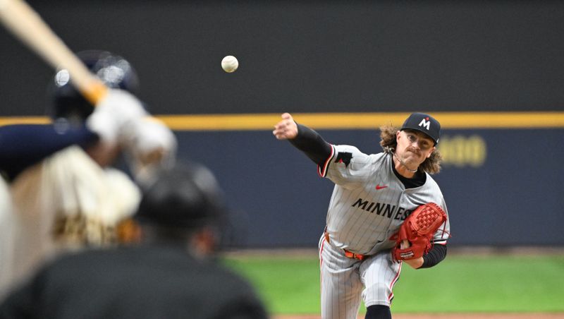 Apr 3, 2024; Milwaukee, Wisconsin, USA; Minnesota Twins starting pitcher Chris Paddack (20) delivers a pitch against the Milwaukee Brewers in the first inning at American Family Field. Mandatory Credit: Michael McLoone-USA TODAY Sports