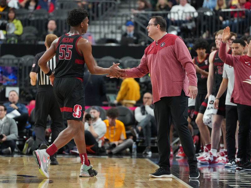 Mar 9, 2023; Las Vegas, NV, USA; Stanford Cardinal head coach Jerod Haase congratulates Stanford Cardinal forward Harrison Ingram (55) after a play against the Arizona Wild Cats during the first half at T-Mobile Arena. Mandatory Credit: Stephen R. Sylvanie-USA TODAY Sports