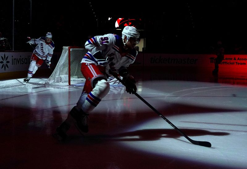 Nov 27, 2024; Raleigh, North Carolina, USA;  New York Rangers right wing Reilly Smith (91) skates just before the start of the game against the Carolina Hurricanes at Lenovo Center. Mandatory Credit: James Guillory-Imagn Images