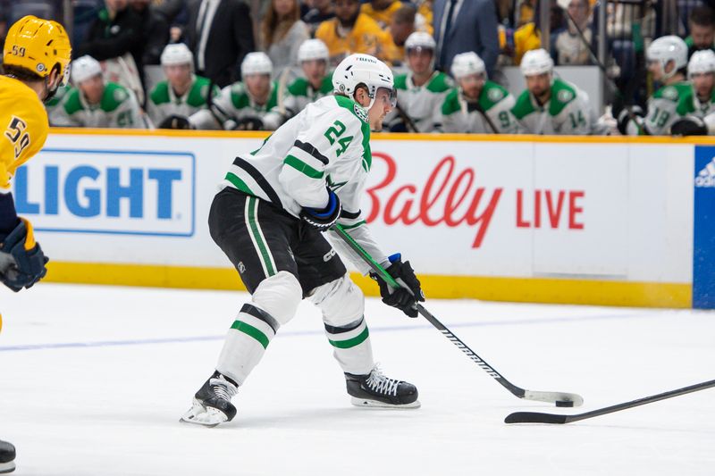 Feb 15, 2024; Nashville, Tennessee, USA; Dallas Stars center Roope Hintz (24) skates with the puck against the Nashville Predators during the second period at Bridgestone Arena. Mandatory Credit: Steve Roberts-USA TODAY Sports