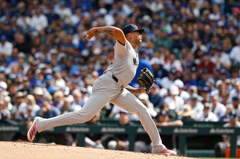 Sep 6, 2024; Chicago, Illinois, USA; New York Yankees starting pitcher Luis Gil (81) delivers a pitch against the Chicago Cubs during the first inning at Wrigley Field. Mandatory Credit: Kamil Krzaczynski-Imagn Images