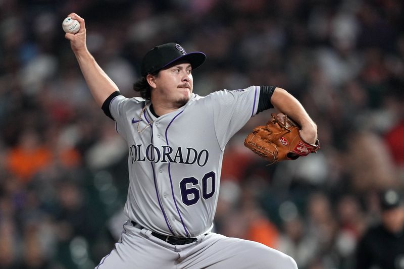 Sep 9, 2023; San Francisco, California, USA; Colorado Rockies relief pitcher Victor Vodnik (60) throws a pitch against the San Francisco Giants during the sixth inning at Oracle Park. Mandatory Credit: Darren Yamashita-USA TODAY Sports