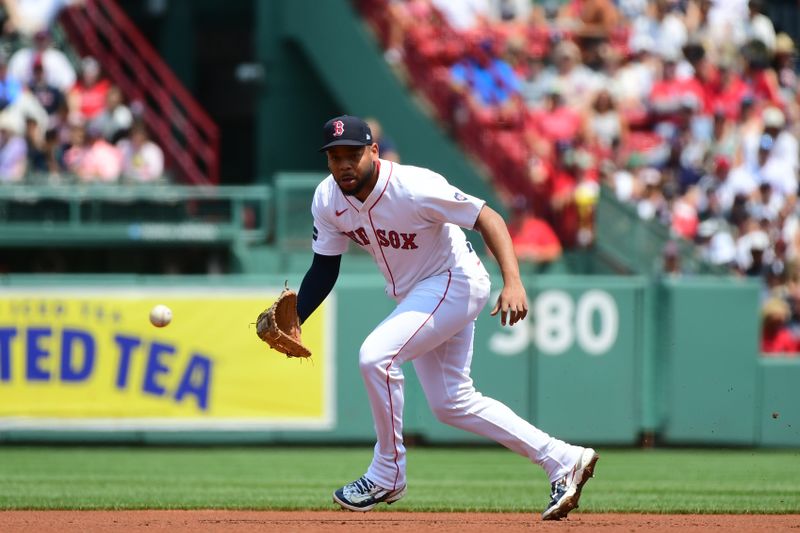 Jul 14, 2024; Boston, Massachusetts, USA;  Boston Red Sox first baseman Dominic Smith (2) fields a ground ball during the first inning against the Kansas City Royals at Fenway Park. Mandatory Credit: Bob DeChiara-USA TODAY Sports