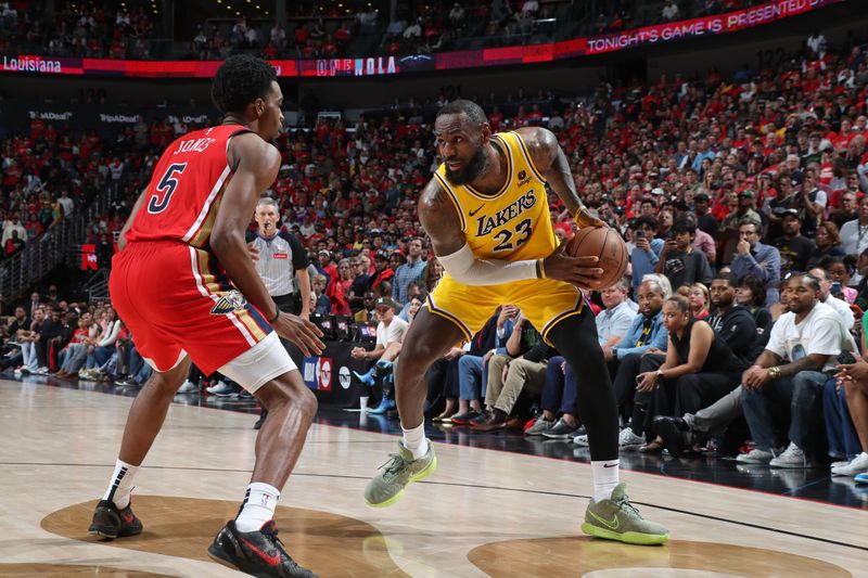 NEW ORLEANS, LA - APRIL 16: LeBron James #23 of the Los Angeles Lakers looks on during the game against the New Orleans Pelicans during the 2024 SoFi Play-In Tournament on April 16, 2024 at the Smoothie King Center in New Orleans, Louisiana. NOTE TO USER: User expressly acknowledges and agrees that, by downloading and or using this Photograph, user is consenting to the terms and conditions of the Getty Images License Agreement. Mandatory Copyright Notice: Copyright 2024 NBAE (Photo by Layne Murdoch Jr./NBAE via Getty Images)