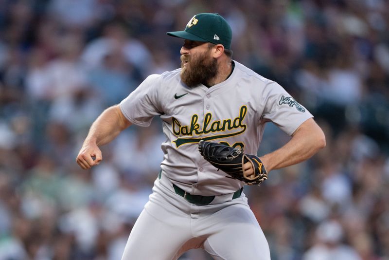 May 11, 2024; Seattle, Washington, USA; Oakland Athletics reliever Austin Adams (29) reacts after delivering a pitch during the seventh inning against the Seattle Mariners at T-Mobile Park. Mandatory Credit: Stephen Brashear-USA TODAY Sports