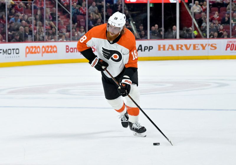 Apr 9, 2024; Montreal, Quebec, CAN; Philadelphia Flyers defenseman Marc Staal (18) plays the puck during the third period of the game against the Montreal Canadiens at the Bell Centre. Mandatory Credit: Eric Bolte-USA TODAY Sports