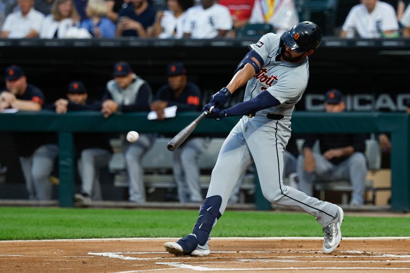 Aug 23, 2024; Chicago, Illinois, USA; Detroit Tigers outfielder Riley Greene (31) hits a double against the Chicago White Sox during the first inning at Guaranteed Rate Field. Mandatory Credit: Kamil Krzaczynski-USA TODAY Sports