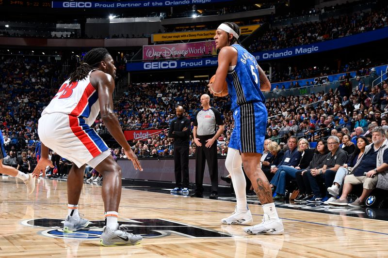 ORLANDO, FL - MARCH 3: Paolo Banchero #5 of the Orlando Magic handles the ball during the game against the Detroit Pistons on March 3, 2024 at the Kia Center in Orlando, Florida. NOTE TO USER: User expressly acknowledges and agrees that, by downloading and or using this photograph, User is consenting to the terms and conditions of the Getty Images License Agreement. Mandatory Copyright Notice: Copyright 2024 NBAE (Photo by Fernando Medina/NBAE via Getty Images)