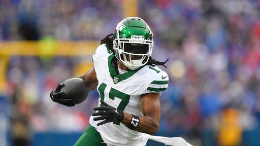 New York Jets wide receiver Davante Adams (17) runs with the ball during the second half of an NFL football game against the Buffalo Bills in Orchard Park, N.Y., Sunday, Dec. 29, 2024. (AP Photo/Adrian Kraus)