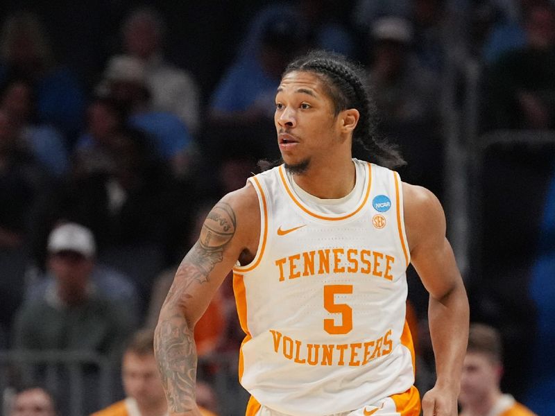 March 23, 2024, Charlotte, NC, USA; Tennessee Volunteers guard Dalton Knecht (3) in action against the Texas Longhorns in the second round of the 2024 NCAA Tournament at the Spectrum Center. Mandatory Credit: Jim Dedmon-USA TODAY Sports