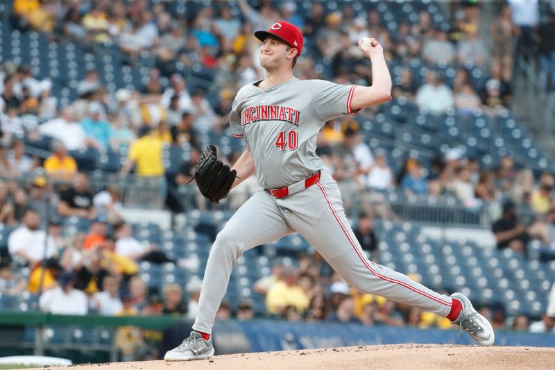 Jun 18, 2024; Pittsburgh, Pennsylvania, USA;  Cincinnati Reds starting pitcher Nick Lodolo (40) delivers a pitch against the Pittsburgh Pirates during the first inning at PNC Park. Mandatory Credit: Charles LeClaire-USA TODAY Sports