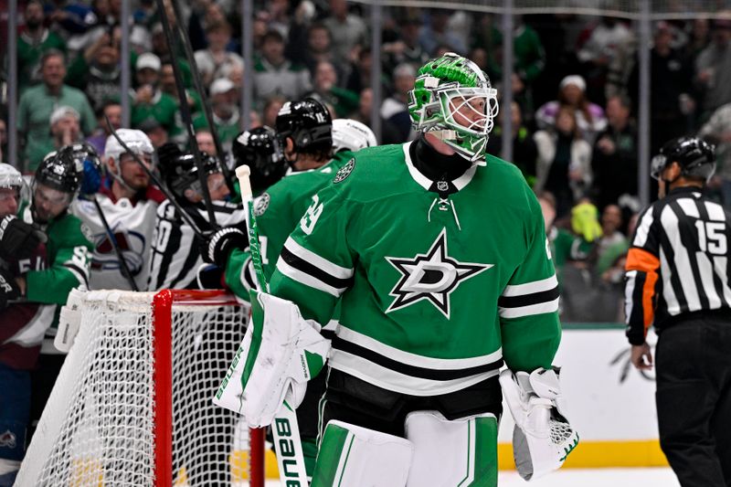 Mar 6, 2026; Dallas, Texas, USA; Dallas Stars goaltender Jake Oettinger (29) skates up ice as the Stars and Colorado Avalanche fight in a scrum during the third period at the American Airlines Center. Mandatory Credit: Jerome Miron-Imagn Images