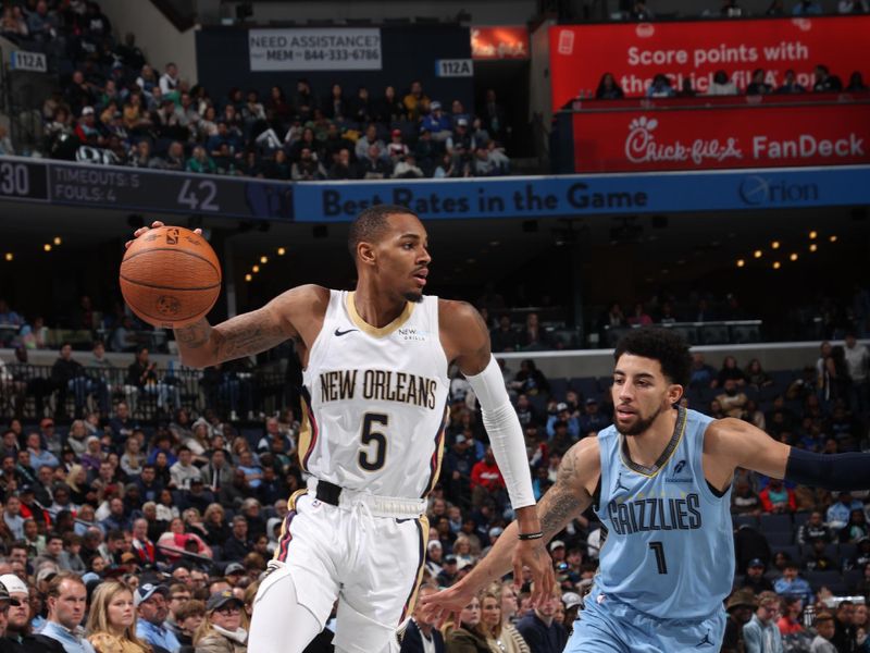 MEMPHIS, TN - NOVEMBER 29: Dejounte Murray #5 of the New Orleans Pelicans handles the ball during the game against the Memphis Grizzlies during the Emirates NBA Cup game on November 29, 2024 at FedExForum in Memphis, Tennessee. NOTE TO USER: User expressly acknowledges and agrees that, by downloading and or using this photograph, User is consenting to the terms and conditions of the Getty Images License Agreement. Mandatory Copyright Notice: Copyright 2024 NBAE (Photo by Joe Murphy/NBAE via Getty Images)