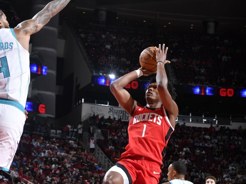 HOUSTON, TX - OCTOBER 23: Amen Thompson #1 of the Houston Rockets shoots the ball during the game against the Charlotte Hornets  during a regular season game on October 23, 2024 at the Toyota Center in Houston, Texas. NOTE TO USER: User expressly acknowledges and agrees that, by downloading and or using this photograph, User is consenting to the terms and conditions of the Getty Images License Agreement. Mandatory Copyright Notice: Copyright 2024 NBAE (Photo by Logan Riely/NBAE via Getty Images)