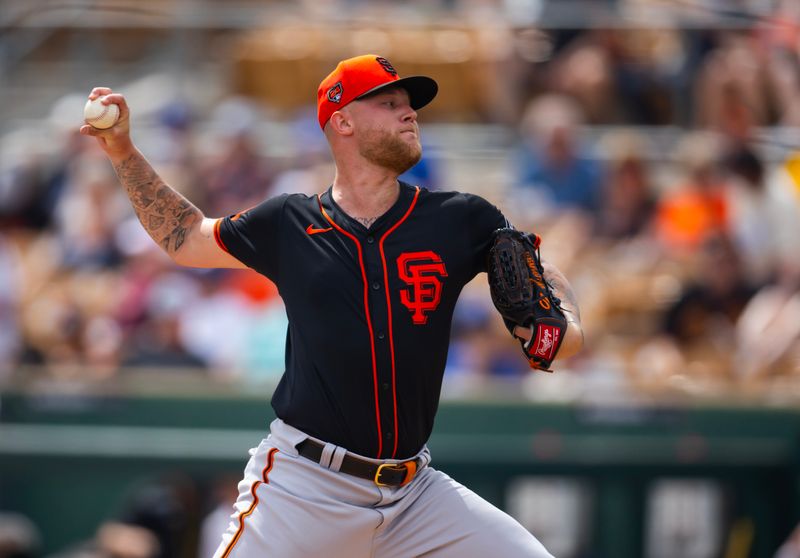 Mar 12, 2024; Phoenix, Arizona, USA; San Francisco Giants pitcher Blayne Enlow against the Los Angeles Dodgers during a spring training baseball game at Camelback Ranch-Glendale. Mandatory Credit: Mark J. Rebilas-USA TODAY Sports