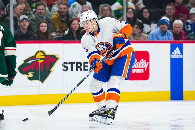 Jan 15, 2024; Saint Paul, Minnesota, USA; New York Islanders center Mathew Barzal (13) shoots during the first period against the Minnesota Wild at Xcel Energy Center. Mandatory Credit: Brace Hemmelgarn-USA TODAY Sports