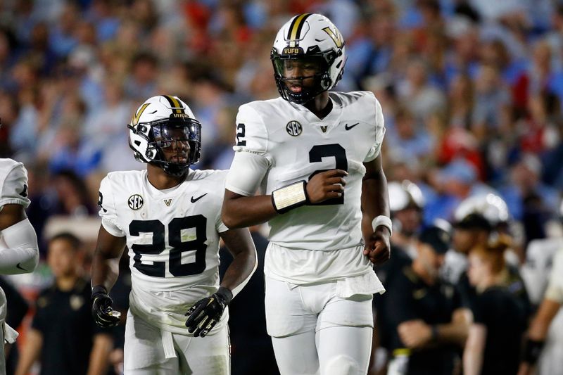 Oct 28, 2023; Oxford, Mississippi, USA; Vanderbilt Commodores quarterback Walter Taylor (2) takes the field after turnover during the second half against the Mississippi Rebels at Vaught-Hemingway Stadium. Mandatory Credit: Petre Thomas-USA TODAY Sports