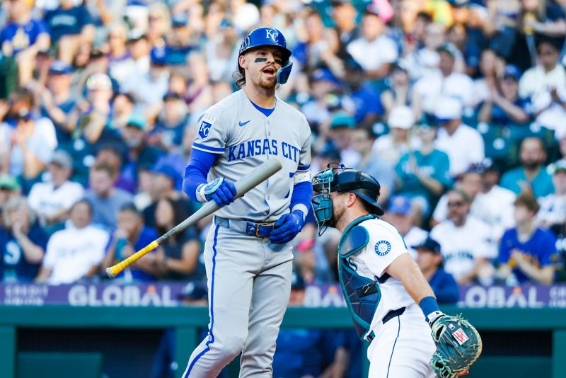 Jun 30, 2025; Seattle, Washington, USA; Kansas City Royals shortstop Bobby Witt Jr. (7) reacts after striking out against the Seattle Mariners during the first inning at T-Mobile Park. Mandatory Credit: Joe Nicholson-Imagn Images