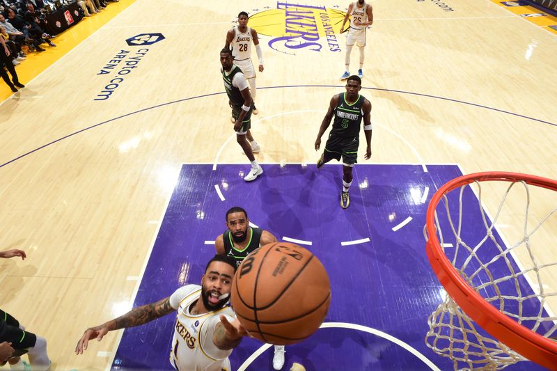 LOS ANGELES, CA - APRIL 7: D'Angelo Russell #1 of the Los Angeles Lakers drives to the basket during the game against the Minnesota Timberwolves on April 7, 2024 at Crypto.Com Arena in Los Angeles, California. NOTE TO USER: User expressly acknowledges and agrees that, by downloading and/or using this Photograph, user is consenting to the terms and conditions of the Getty Images License Agreement. Mandatory Copyright Notice: Copyright 2024 NBAE (Photo by Juan Ocampo/NBAE via Getty Images)