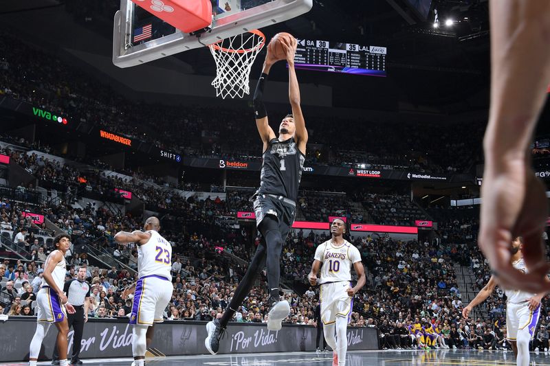 SAN ANTONIO, TX - OCTOBER 22:  Victor Wembanyama #1 of the San Antonio Spurs drives to the basket during the NBA Cup game against the Los Angeles Lakers on October 22, 2024 at the Frost Bank Center in San Antonio, Texas. NOTE TO USER: User expressly acknowledges and agrees that, by downloading and or using this photograph, user is consenting to the terms and conditions of the Getty Images License Agreement. Mandatory Copyright Notice: Copyright 2024 NBAE (Photos by Michael Gonzales/NBAE via Getty Images)