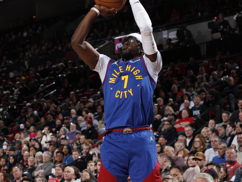 PORTLAND, OR - FEBRUARY 23: Reggie Jackson #7 of the Denver Nuggets shoots the ball during the game against the Portland Trail Blazers on February 23, 2024 at the Moda Center Arena in Portland, Oregon. NOTE TO USER: User expressly acknowledges and agrees that, by downloading and or using this photograph, user is consenting to the terms and conditions of the Getty Images License Agreement. Mandatory Copyright Notice: Copyright 2024 NBAE (Photo by Cameron Browne/NBAE via Getty Images)