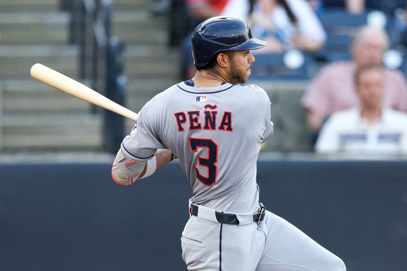 May 19, 2025; Tampa, Florida, USA; Houston Astros shortstop Jeremy Pena (3) singles against the Tampa Bay Rays in the third inning at George M. Steinbrenner Field. Mandatory Credit: Nathan Ray Seebeck-Imagn Images