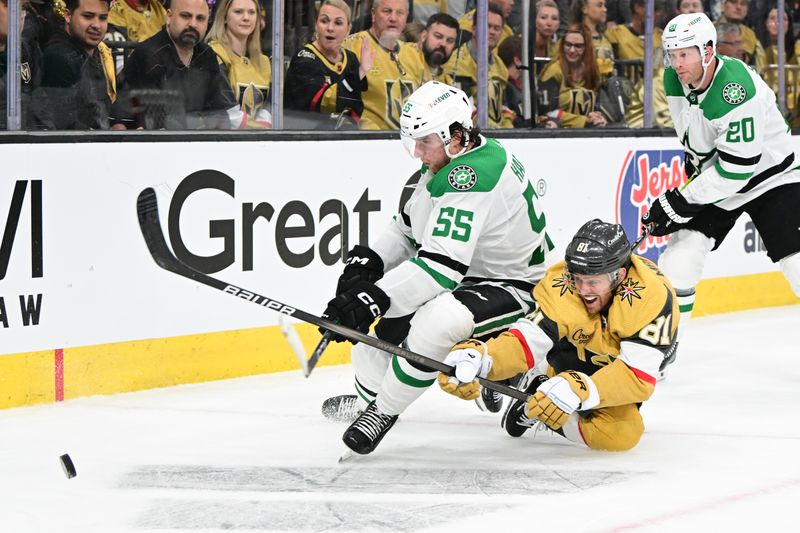 Apr 27, 2024; Las Vegas, Nevada, USA; Dallas Stars defenseman Thomas Harley (55) and Vegas Golden Knights right wing Jonathan Marchessault (81) battle for the puck in the third period in game three of the first round of the 2024 Stanley Cup Playoffs at T-Mobile Arena. Mandatory Credit: Candice Ward-USA TODAY Sports