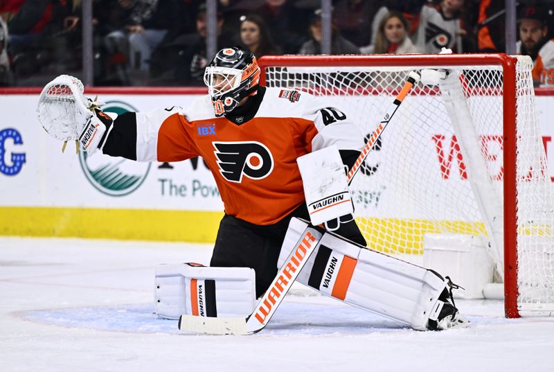 Jan 27, 2024; Philadelphia, Pennsylvania, USA; Philadelphia Flyers goalie Cal Petersen (40) defends the net against the Boston Bruins in the third period at Wells Fargo Center. Mandatory Credit: Kyle Ross-USA TODAY Sports