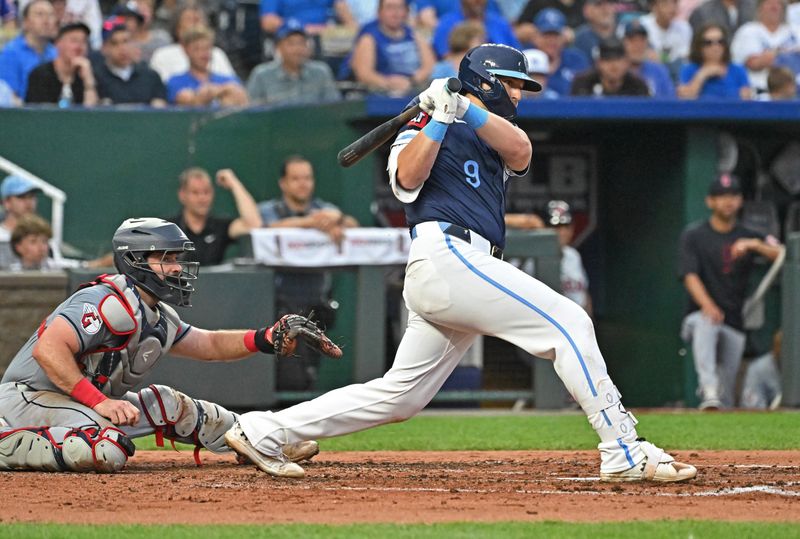 Jun 28, 2024; Kansas City, Missouri, USA;  Kansas City Royals first baseman Vinnie Pasquantino (9) hits a RBI single in the third inning against the Cleveland Guardians at Kauffman Stadium. Mandatory Credit: Peter Aiken-USA TODAY Sports