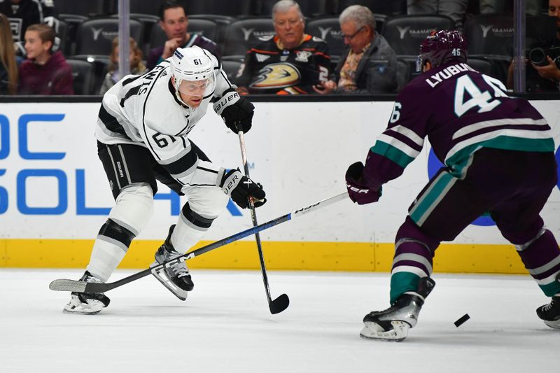 Nov 24, 2023; Anaheim, California, USA; Los Angeles Kings center Trevor Lewis (61) shoots on goal against Anaheim Ducks defenseman Ilya Lyubushkin (46) during the first period at Honda Center. Mandatory Credit: Gary A. Vasquez-USA TODAY Sports