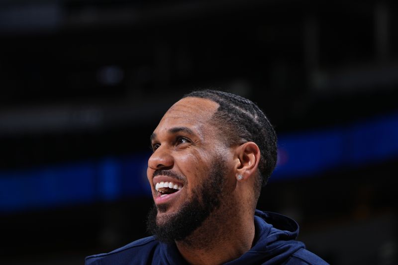 DENVER, CO - MARCH 29: Monte Morris #23 of the Minnesota Timberwolves smiles before the game against the Denver Nuggets on March 29, 2024 at the Ball Arena in Denver, Colorado. NOTE TO USER: User expressly acknowledges and agrees that, by downloading and/or using this Photograph, user is consenting to the terms and conditions of the Getty Images License Agreement. Mandatory Copyright Notice: Copyright 2024 NBAE (Photo by Garrett Ellwood/NBAE via Getty Images)