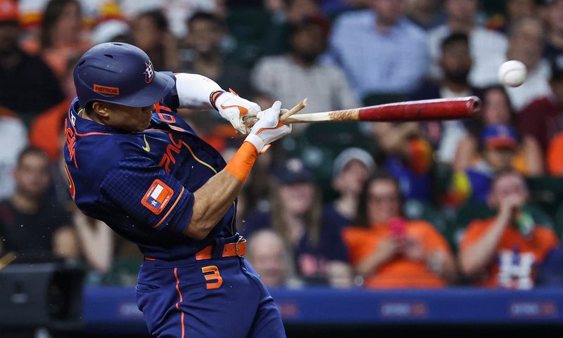May 1, 2023; Houston, Texas, USA; Houston Astros shortstop Jeremy Pena (3) has a broken bat on an RBI single during the seventh inning against the San Francisco Giants at Minute Maid Park. Mandatory Credit: Troy Taormina-USA TODAY Sports