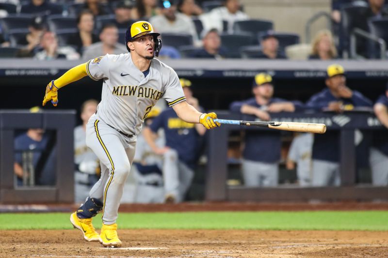 Sep 8, 2023; Bronx, New York, USA;  Milwaukee Brewers shortstop Willy Adames (27) hits an RBI double in the seventh inning against the New York Yankees at Yankee Stadium. Mandatory Credit: Wendell Cruz-USA TODAY Sports