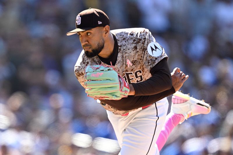 May 12, 2024; San Diego, California, USA; San Diego Padres relief pitcher Robert Suarez (75) throws a pitch against the Los Angeles Dodgers during the ninth inning at Petco Park. Mandatory Credit: Orlando Ramirez-USA TODAY Sports