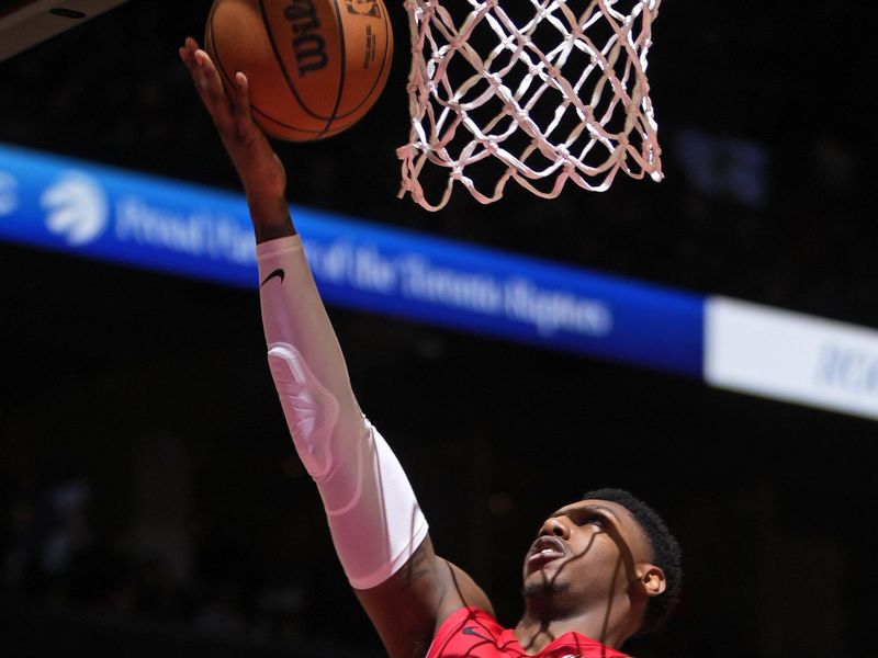 TORONTO, CANADA - FEBRUARY 14: RJ Barrett #9 of the Toronto Raptors drives to the basket during the game against the Indiana Pacers on February 14, 2024 at the Scotiabank Arena in Toronto, Ontario, Canada.  NOTE TO USER: User expressly acknowledges and agrees that, by downloading and or using this Photograph, user is consenting to the terms and conditions of the Getty Images License Agreement.  Mandatory Copyright Notice: Copyright 2024 NBAE (Photo by Mark Blinch/NBAE via Getty Images)