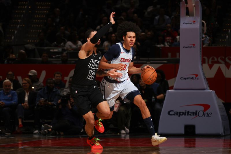 WASHINGTON, DC -? FEBRUARY 24:  Kyshawn George #18 of the Washington Wizards handles the ball during the game against the Brooklyn Nets on February 24, 2025 at Capital One Arena in Washington, DC. NOTE TO USER: User expressly acknowledges and agrees that, by downloading and or using this Photograph, user is consenting to the terms and conditions of the Getty Images License Agreement. Mandatory Copyright Notice: Copyright 2025 NBAE (Photo by Stephen Gosling/NBAE via Getty Images)