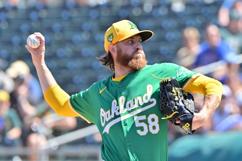 Mar 20, 2024; Mesa, Arizona, USA;  Oakland Athletics starting pitcher Paul Blackburn (58) throws in the first inning against the Chicago Cubs during a spring training game at Hohokam Stadium. Mandatory Credit: Matt Kartozian-USA TODAY Sports