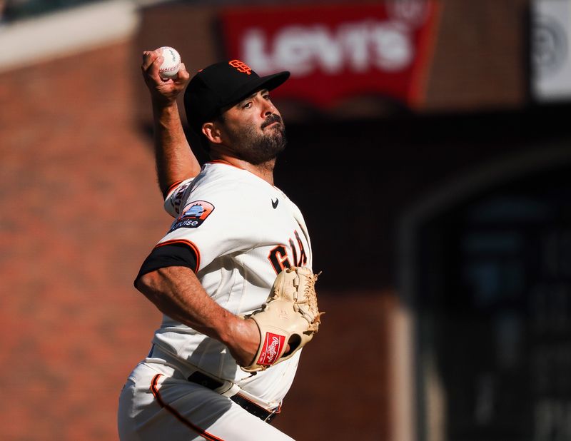 Aug 27, 2023; San Francisco, California, USA; San Francisco Giants relief pitcher Scott Alexander (54) pitches the ball against the Atlanta Braves during the fifth inning at Oracle Park. Mandatory Credit: Kelley L Cox-USA TODAY Sports