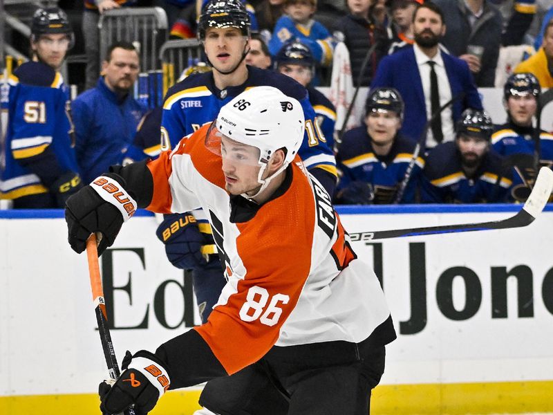 Jan 15, 2024; St. Louis, Missouri, USA;  Philadelphia Flyers left wing Joel Farabee (86) shoots and scores an empty net goal against the St. Louis Blues during the third period at Enterprise Center. Mandatory Credit: Jeff Curry-USA TODAY Sports