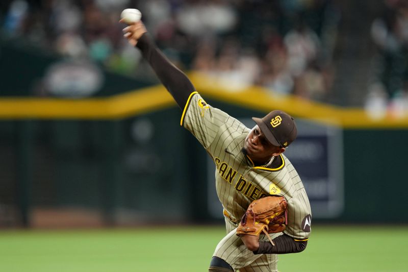 May 3, 2024; Phoenix, Arizona, USA; San Diego Padres pitcher Jhony Brito (76) pitches against the Arizona Diamondbacks during the ninth inning at Chase Field. Mandatory Credit: Joe Camporeale-USA TODAY Sports