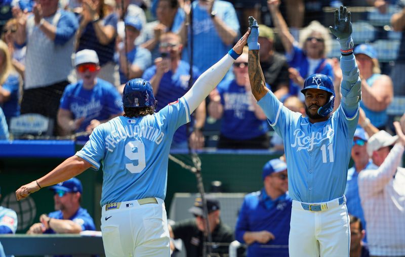 May 8, 2025; Kansas City, Missouri, USA; Kansas City Royals first baseman Vinnie Pasquantino (9) celebrates with third baseman Maikel Garcia (11) after scoring a run during the first inning against the Chicago White Sox at Kauffman Stadium. Mandatory Credit: Jay Biggerstaff-Imagn Images
