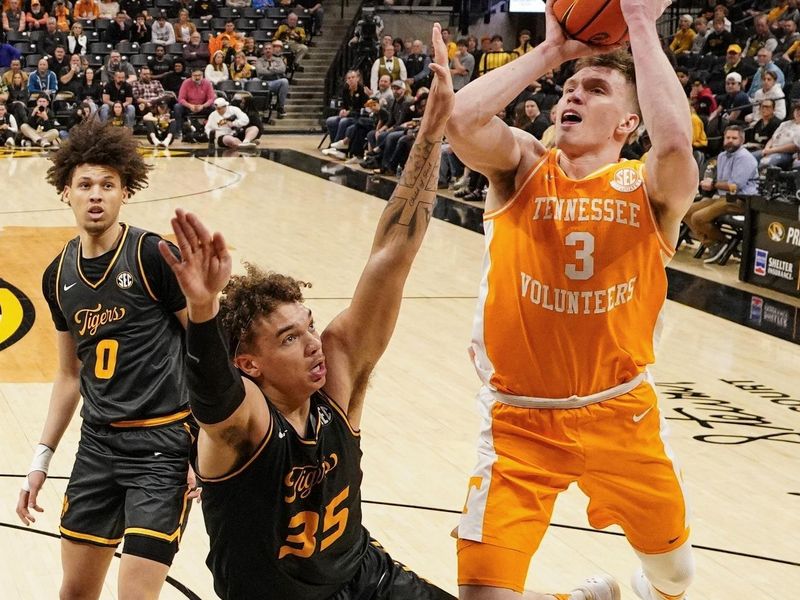 Feb 20, 2024; Columbia, Missouri, USA; Tennessee Volunteers guard Dalton Knecht (3) shoots as Missouri Tigers forward Noah Carter (35) defends during the second half at Mizzou Arena. Mandatory Credit: Denny Medley-USA TODAY Sports