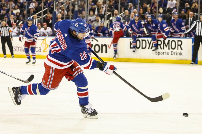 May 5, 2024; New York, New York, USA; New York Rangers left wing Artemi Panarin (10) attempts a shot on goal in the second period against the Carolina Hurricanes in game one of the second round of the 2024 Stanley Cup Playoffs at Madison Square Garden. Mandatory Credit: Wendell Cruz-USA TODAY Sports