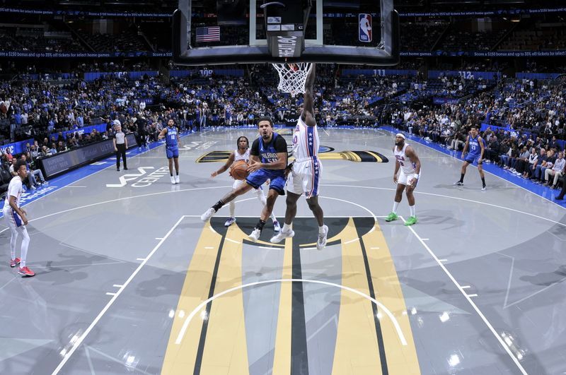 ORLANDO, FL - NOVEMBER 15: Cole Anthony #50 of the Orlando Magic shoots the ball during the game against the Philadelphia 76ers during the Emirates NBA Cup game on  November 15, 2024 at Kia Center in Orlando, Florida. NOTE TO USER: User expressly acknowledges and agrees that, by downloading and or using this photograph, User is consenting to the terms and conditions of the Getty Images License Agreement. Mandatory Copyright Notice: Copyright 2024 NBAE (Photo by Fernando Medina/NBAE via Getty Images)