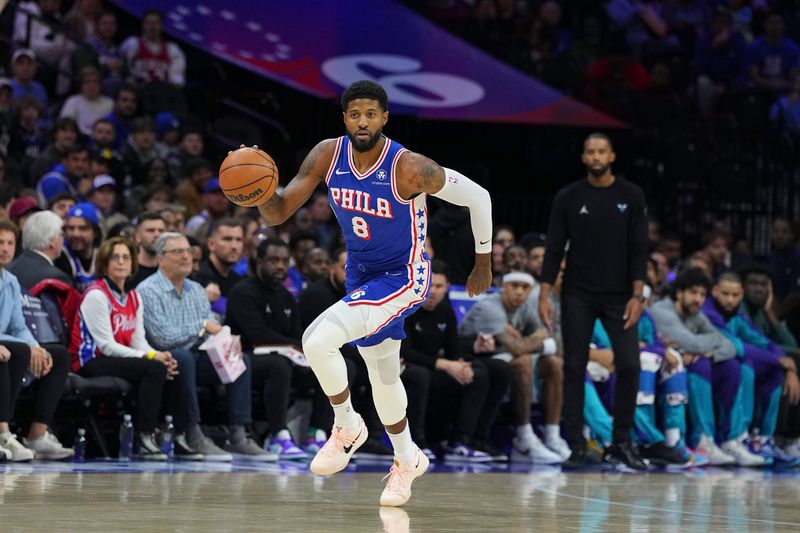 PHILADELPHIA, PENNSYLVANIA - NOVEMBER 10: Paul George #8 of the Philadelphia 76ers dribbles the ball against the Charlotte Hornets in the first half at the Wells Fargo Center on November 10, 2024 in Philadelphia, Pennsylvania. NOTE TO USER: User expressly acknowledges and agrees that, by downloading and/or using this photograph, user is consenting to the terms and conditions of the Getty Images License Agreement. (Photo by Mitchell Leff/Getty Images)