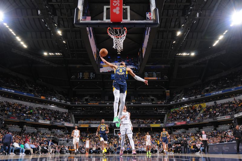 INDIANAPOLIS, IN - APRIL 1: Tyrese Haliburton #0 of the Indiana Pacers dunks the ball during the game against the Brooklyn Nets on April 1, 2024 at Gainbridge Fieldhouse in Indianapolis, Indiana. NOTE TO USER: User expressly acknowledges and agrees that, by downloading and or using this Photograph, user is consenting to the terms and conditions of the Getty Images License Agreement. Mandatory Copyright Notice: Copyright 2024 NBAE (Photo by Ron Hoskins/NBAE via Getty Images)