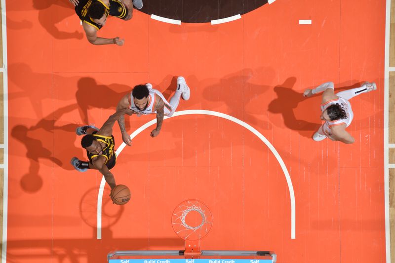 SAN ANTONIO, TX - MARCH 31: Andrew Wiggins #22 of the Golden State Warriors drives to the basket during the game against the San Antonio Spurs on March 31, 2024 at the Frost Bank Center in San Antonio, Texas. NOTE TO USER: User expressly acknowledges and agrees that, by downloading and or using this photograph, user is consenting to the terms and conditions of the Getty Images License Agreement. Mandatory Copyright Notice: Copyright 2024 NBAE (Photos by Michael Gonzales/NBAE via Getty Images)