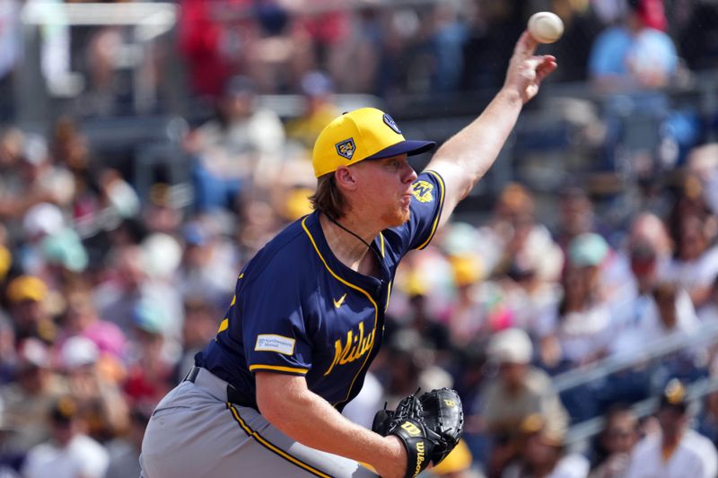 Feb 24, 2024; Peoria, Arizona, USA; Milwaukee Brewers pitcher Rob Zastrynzy (58) pitches against the San Diego Padres during the first inning of a Spring Training game at Peoria Sports Complex. Mandatory Credit: Joe Camporeale-USA TODAY Sports