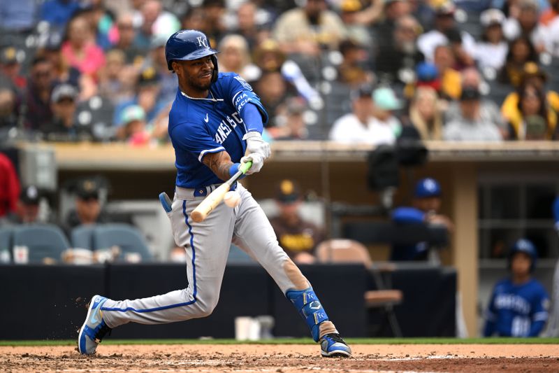 May 17, 2023; San Diego, California, USA; Kansas City Royals third baseman Maikel Garcia (11) hits an RBI double during the sixth inning against the San Diego Padres at Petco Park. Mandatory Credit: Orlando Ramirez-USA TODAY Sports